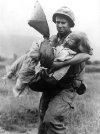 Vietnam Soldier carrying woman.jpg