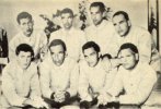 North_Korean_Propaganda_Photograph_of_prisoners_of_the_USS_Pueblo,_with_the_Hawaiian_Good_Luck...jpg